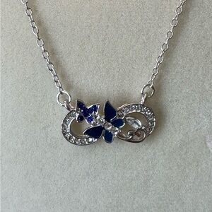 Elegant Sterling Silver and Blue Butterfly Necklace